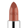 A close-up of the creamy 1975 Shiny Velvet Cream Lipstick #9 in a smooth brown-beige by Nikol Beauty, embossed with NIKOL. Its gleaming silver base and pointed tip ensure a perfect, cruelty-free pout.