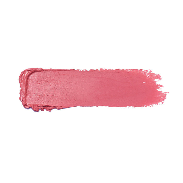 An ultra-creamy swipe of Nikol Beautys Actually, I Can Shiny Velvet Cream Lipstick #33 adorns a white background, revealing its vibrant pink hue. The slightly uneven edges emphasize the lipstick’s hydrating application, combining elegance with nourishing properties.