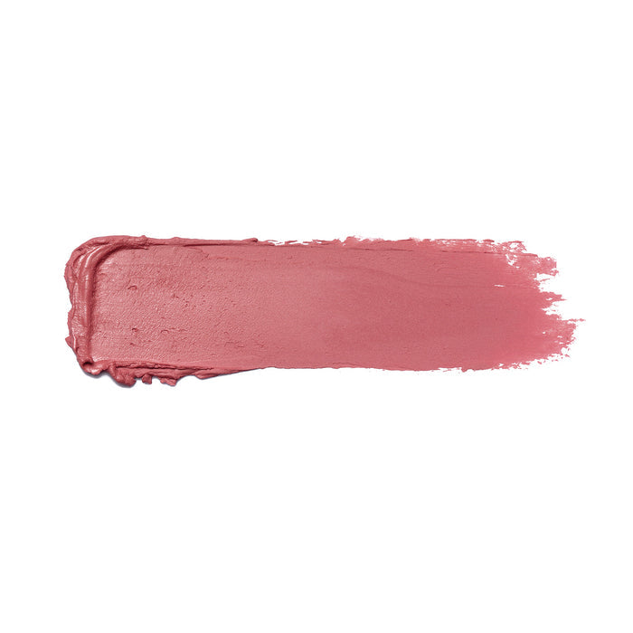 The Aperitif Shiny Velvet Cream Lipstick #419 by Nikol Beauty is shown smeared on a white background, showcasing its creamy matte finish. Ideal for mature lips, this hydrating, all-day-comfort formula is also proudly cruelty-free.
