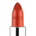 Close-up of Beach House Shiny Velvet Cream Lipstick #122 from Nikol Beauty, in a vibrant orange-red shade. This hydrating lipstick, enriched with shea butter for smooth application and nourishment, features a shiny silver base contrasting with the plain white background and has the brand name engraved on the bullet.