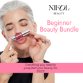 A short-haired woman joyfully kisses a lipstick, showcasing the Beginner Beauty Bundle by Nikol Beauty—your 2025 makeup starter kit with all essentials!.