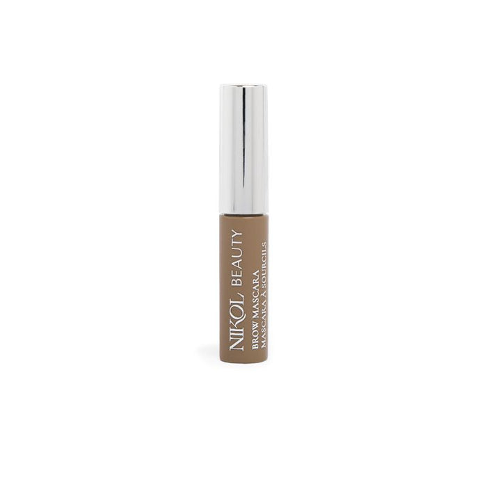 A small Nikol Beauty Brow Mascara features a silver cap and brown label with brand name and description. Known for high pigment, it defines eyebrows. The tube stands upright on a plain white background.