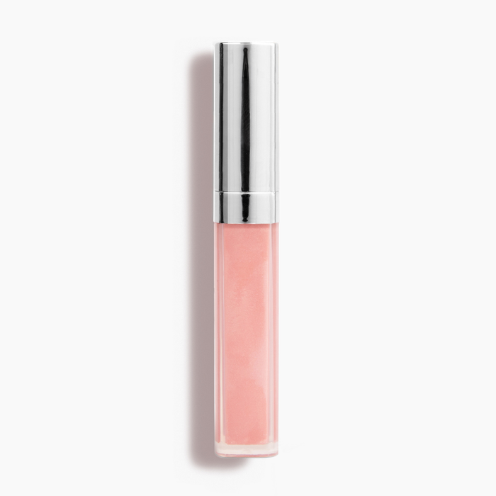 Champs Lip Gloss #461 by Nikol Beauty, in a clear tube with non-sticky pink gloss and a shiny silver cap, is positioned vertically on a plain white background, promising high-impact shine.