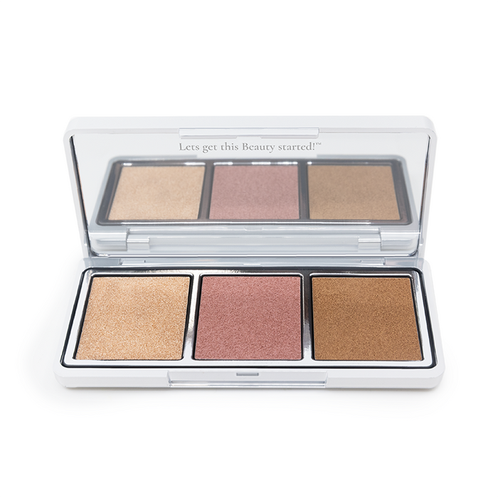 The Classic Beach Glow Palette by Nikol Beauty is an open makeup set with shimmering gold, pink, and bronze shades. It has a lid crafted using Hot-Pour Technology that features Lets get this Beauty started! against a white backdrop.