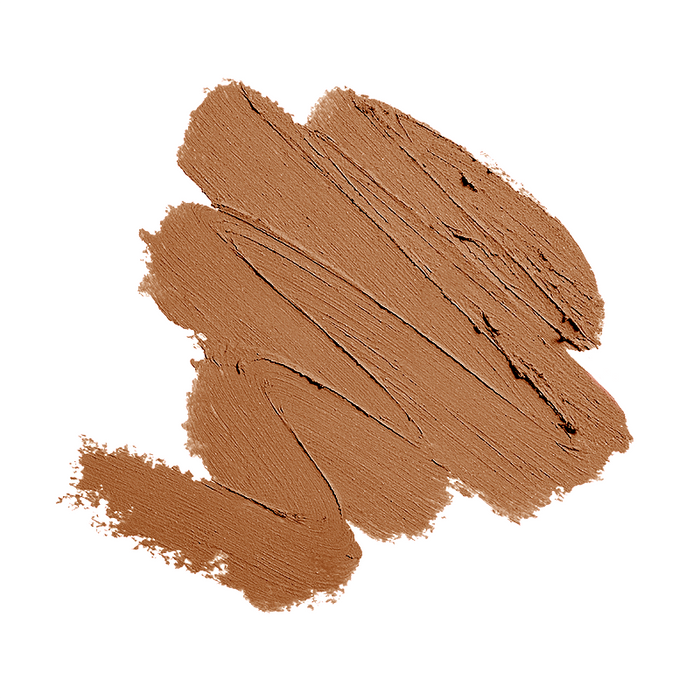 A swatch of Nikol Beautys Cream Blush Stick against a white background highlights its texture and rich color depth—ideal for mature beauty.