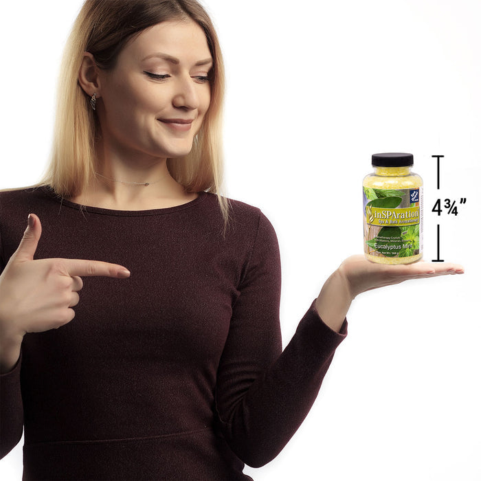woman holding bottle of Insparation aromatherapy