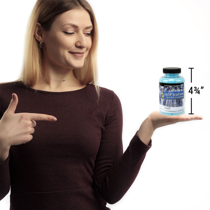 woman holding bottle of Insparation aromatherapy