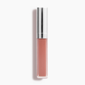 The Good Vibes Lip Gloss #443 by Nikol Beauty, in a nude shade with high-impact shine and a metallic silver cap, stands upright against a plain white backdrop.