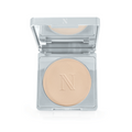 The Nikita Banana Brightening Powder by Nikol Beauty comes in a compact silver case with a mirror and features a beige pressed powder embossed with an N for flawless application.