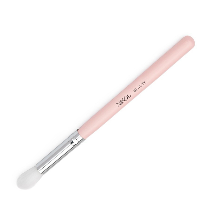 The Nikol Beauty Eyeshadow Blending Brush features a pink handle with Nikol Beauty inscribed, a silver ferrule, and soft white bristles ideal for mature eyes. Crafted from 100% vegan materials.