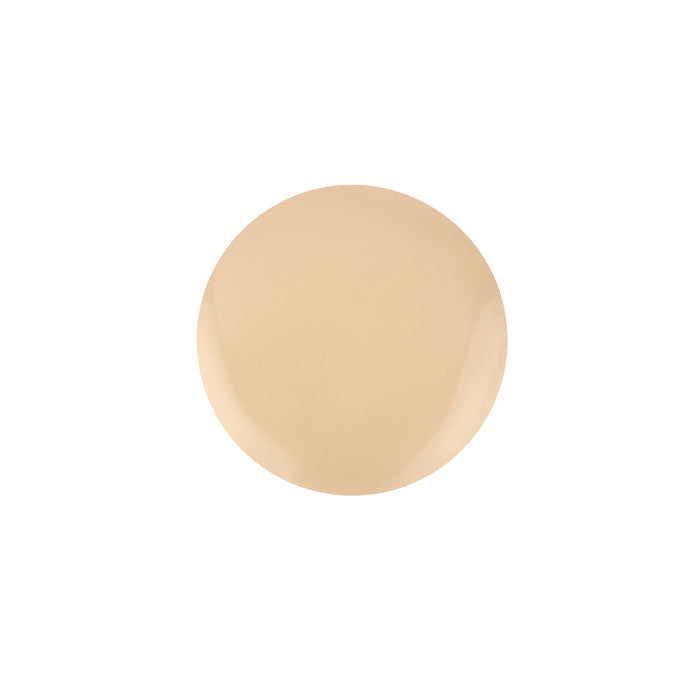 A beige, round paint swatch on a white background highlights Nikol Beautys Serum Foundation, encapsulating the essence of clean, customizable coverage.