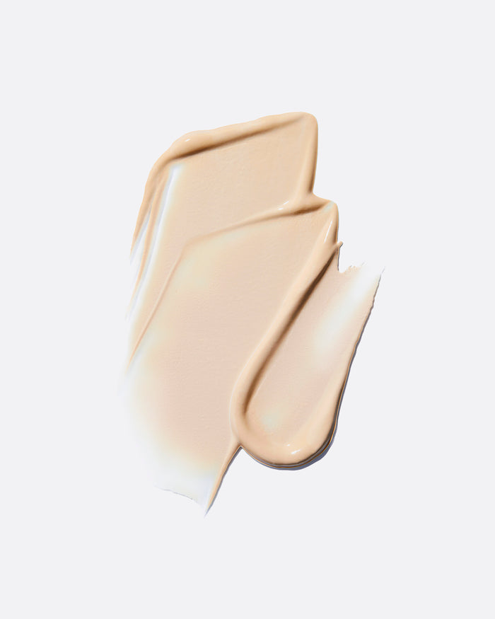 Skin Mimetic Concealer swatch in shade 01 Fair N, a porcelain to fair neutral-toned concealer for very fair complexions.