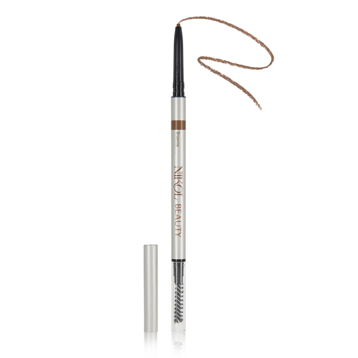 The Skinny Brow Pencil by Nikol Beauty is a slender, dual-ended precision brow tool in brown. One end has an ultra-smooth retractable tip, while the other includes a spoolie brush. The white pencil features branding text, with its cap conveniently set aside for easy access.