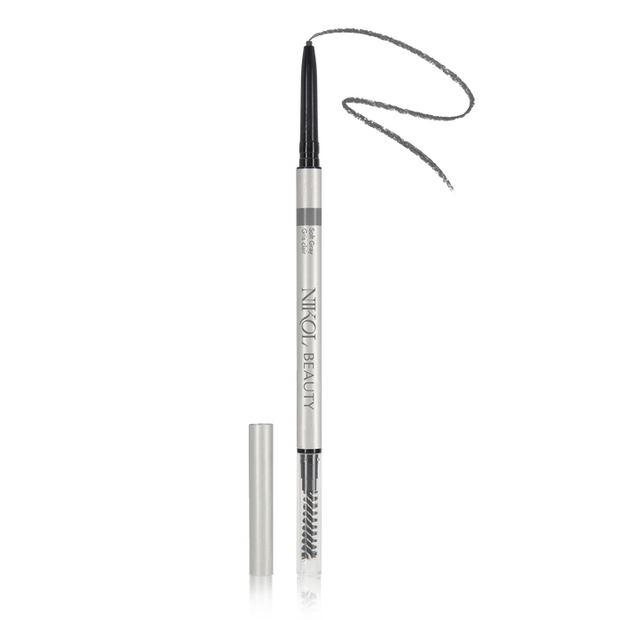 The Nikol Beauty Skinny Brow Pencil is displayed standing vertically with the cap removed, showcasing a fine-tip in silver and black for precise eyebrow definition. Its lower end features a spoolie brush perfect for achieving an ultra-smooth look.