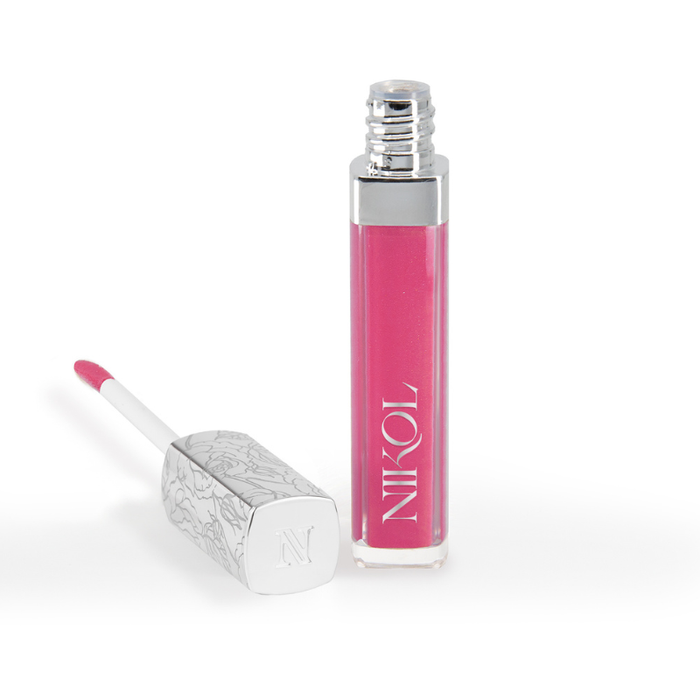 Upgrade Lip Gloss #94 from Nikol Beauty features a chic pink shine and a silver-patterned cap. Labeled in white, it rests beside its upright tube on a plain white background—an ideal formula for the mature woman.