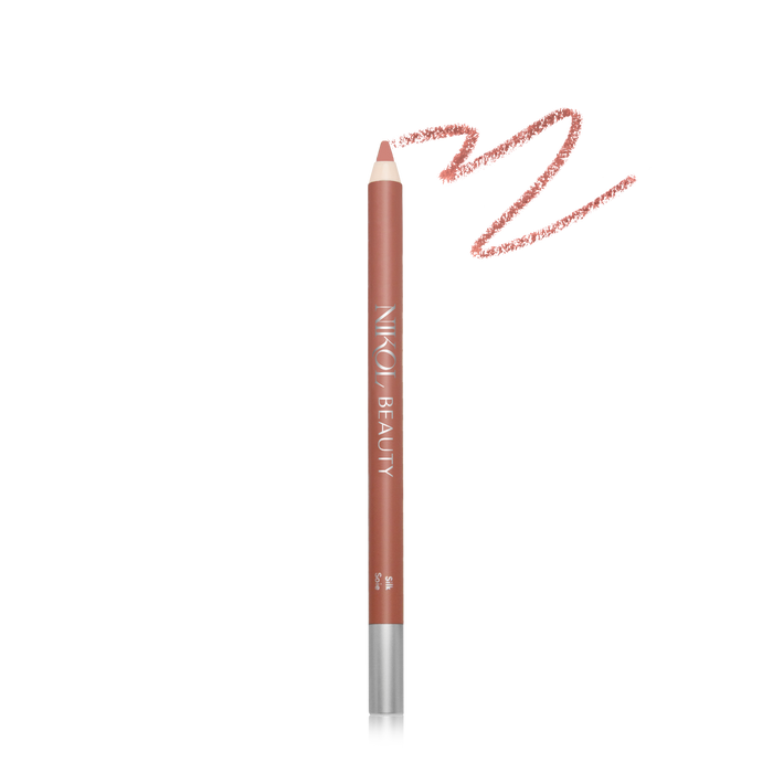 A brown Nikol Beauty Waterproof Lip Liner Pencil is shown with a smudged stroke beside it. This creamy liner is perfect for mature women, offering long-lasting color and definition.