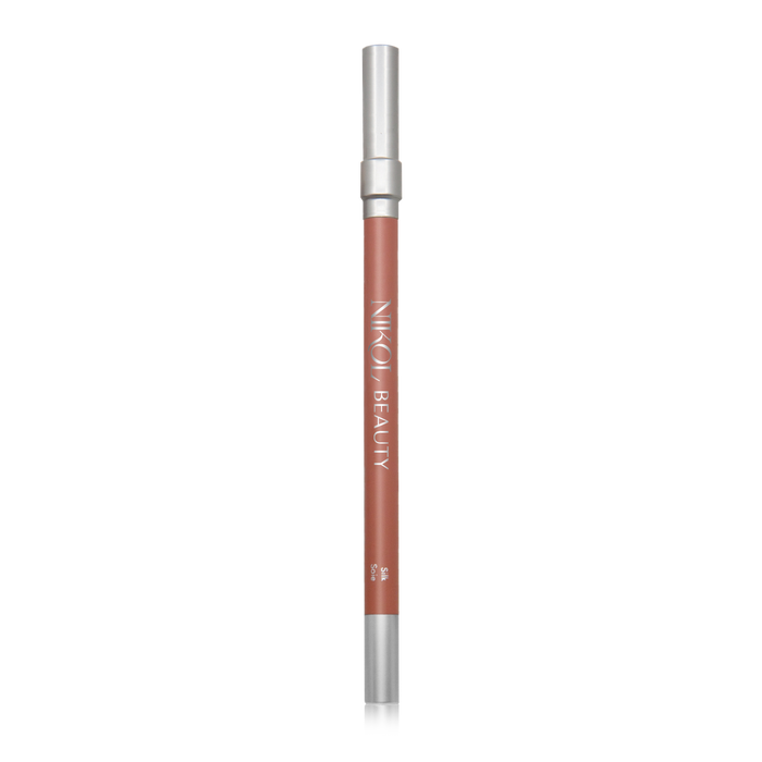 The WaterProof Lip Liner Pencils by Nikol Beauty, ideal for mature women, boast a creamy brown shade with a silver cap and base, the brand name in white on the side. Displayed against a white backdrop, it ensures precision and elegance.