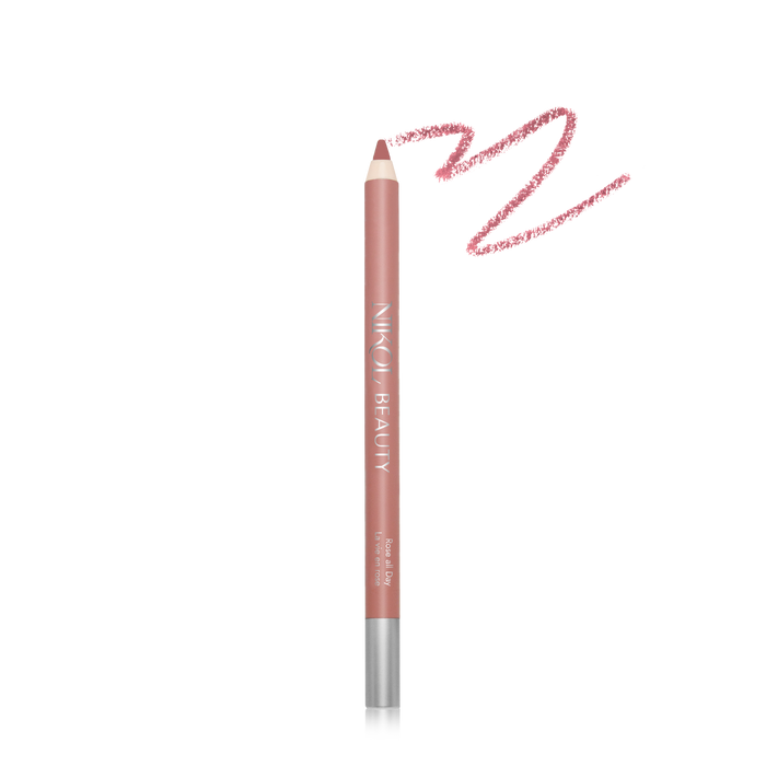A pink creamy Nikol Beauty WaterProof Lip Liner Pencil features a silver cap, ideal for mature women makeup, on a white background. A swatch curves above it with the brand name printed in white on the side.
