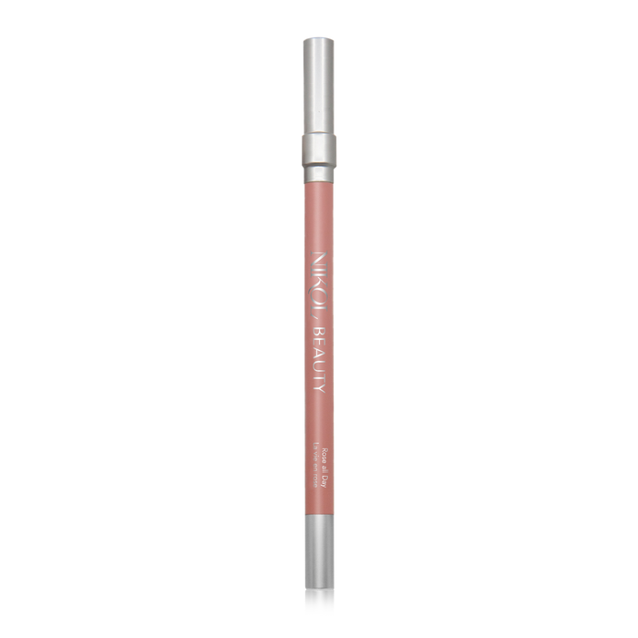 The Nikol Beauty WaterProof Lip Liner Pencil, with silver caps and a creamy pink hue, adds a flawless touch for mature women seeking elegance. This versatile addition effortlessly enhances any makeup collection.